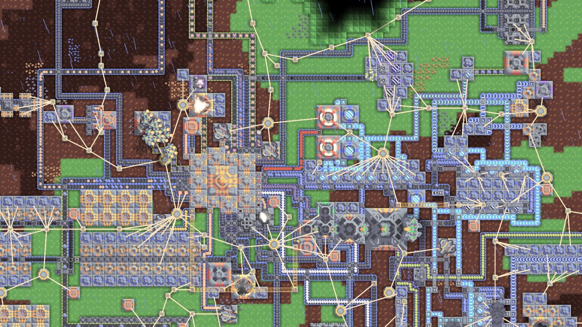 A large automated Mindustry factory with conveyors, power links and defenses